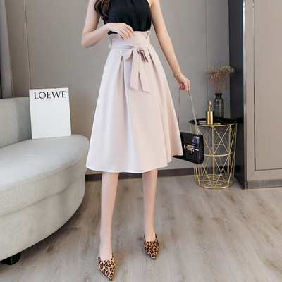 Model fustă de damă croiată cu talie înaltă și cravate