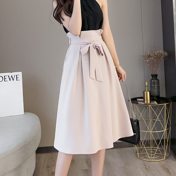 Model fustă de damă croiată cu talie înaltă și cravate