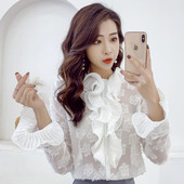 Elegants sieviešu krekls ar garām piedurknēm