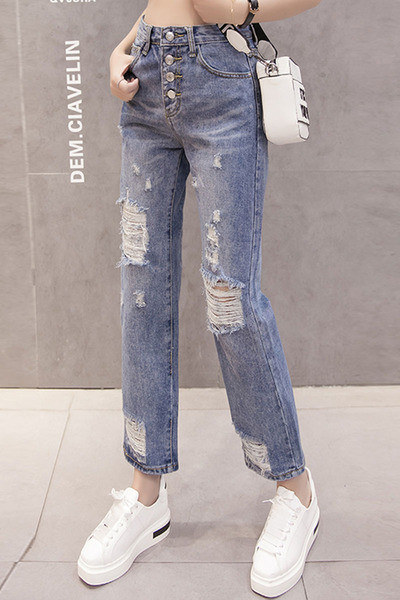 Moteriški aktualūs džinsai su plėšytais motyvais tiesus modelis