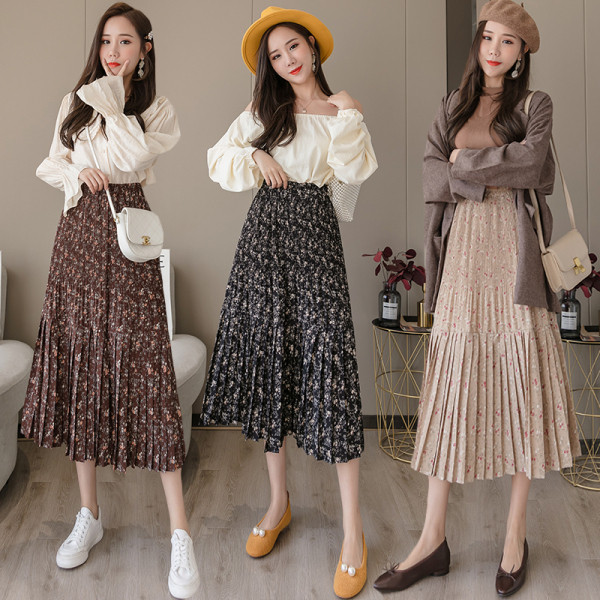 Naiste pikk vabaaja seelik kõrge vöökoha ja lillemustriga