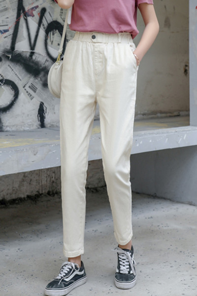 Női alkalmi nadrág zsebekkel, magas derékkal