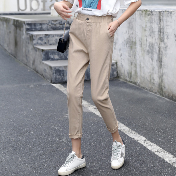 Női alkalmi nadrág zsebekkel, magas derékkal