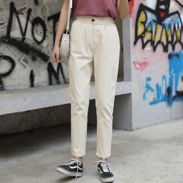 Női alkalmi nadrág zsebekkel, magas derékkal