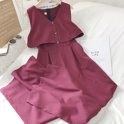 Kaasaegne naiste kombinesoon spits-kaelusega ja nööpidega – lai mudel