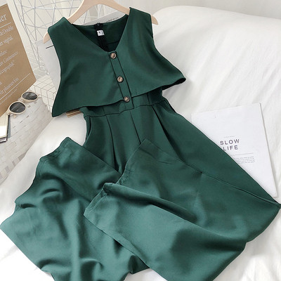 Kaasaegne naiste kombinesoon spits-kaelusega ja nööpidega – lai mudel