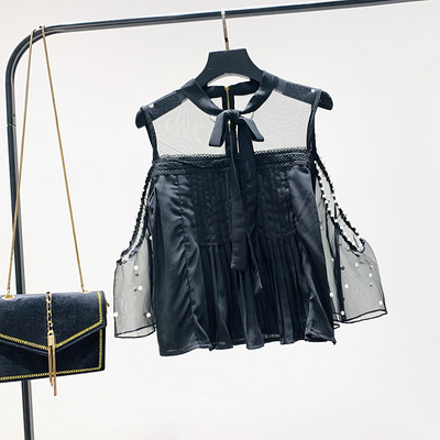 Moderns sieviešu krekls ar ovālu kakla izgriezumu, zīmogveida piedurknēm ar pērlēm un izgriezumiem