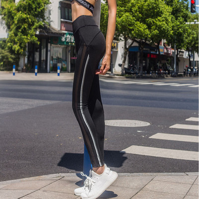 Melni sporta legingi ar augstu vidukli un krāsainām apmalītēm