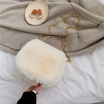 Moderna sieviešu dūnu soma ar garu un īsu metāla rokturi