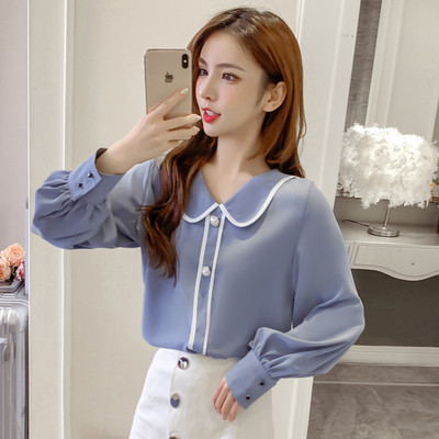 Dabartiniai moteriški marškiniai su sagutėmis ir špicine iškirpte