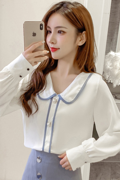 Dabartiniai moteriški marškiniai su sagutėmis ir špicine iškirpte