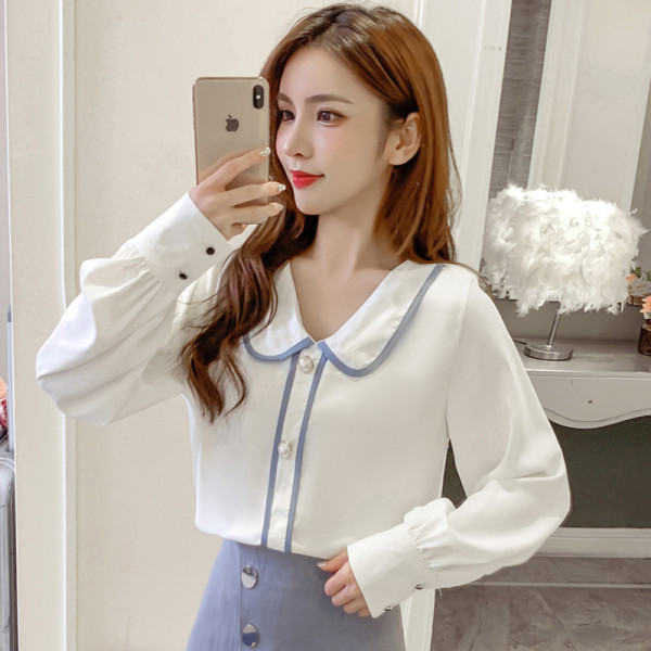 Dabartiniai moteriški marškiniai su sagutėmis ir špicine iškirpte