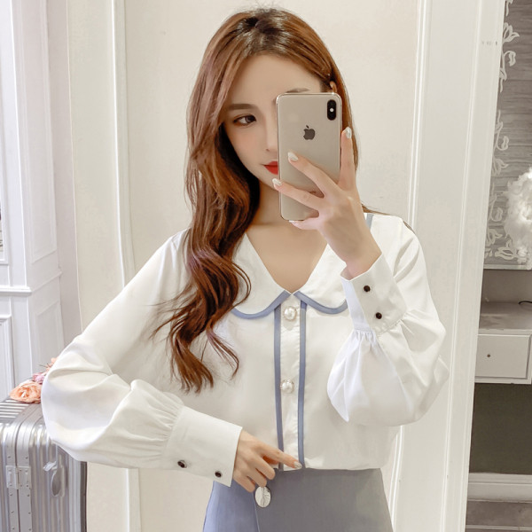 Dabartiniai moteriški marškiniai su sagutėmis ir špicine iškirpte