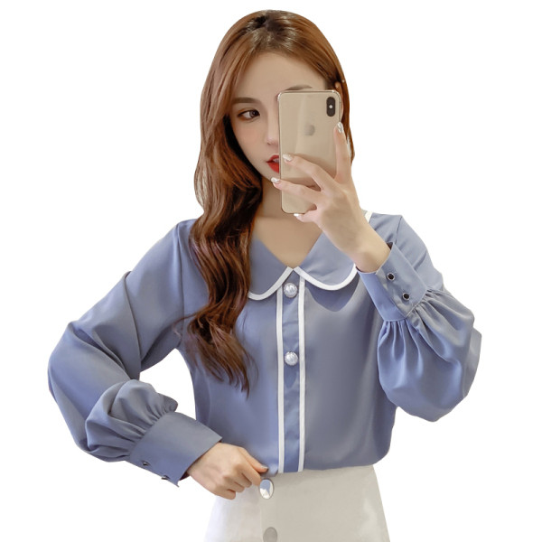 Dabartiniai moteriški marškiniai su sagutėmis ir špicine iškirpte