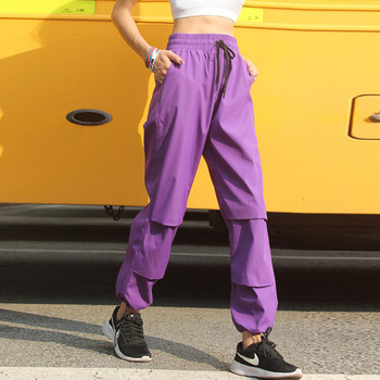 Широк модел спортен дамски панталон с еластична талия и надписи
