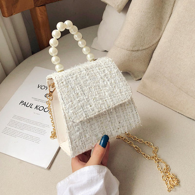 Stilīga sieviešu soma ar garu metāla rokturi un īsu rokturi ar pērlēm