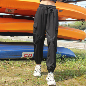 Ευρύ μοντέλο αθλητικό παντελόνι με ελαστική μέση και τσέπες