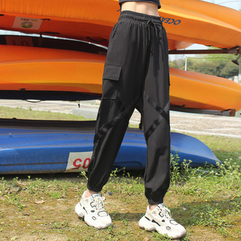 Широк модел спортен дамски панталон с еластична талия и джобове