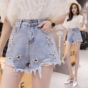 Γυναικεία casual short jeans με υψηλή μέση και διακόσμιτικές πέρλες σε μπλε χρώμα