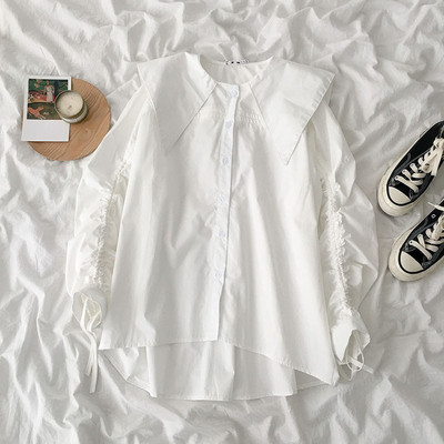 Modern női ing kerek nyakkivágással és nyakkendővel