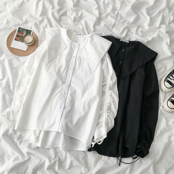 Modern női ing kerek nyakkivágással és nyakkendővel