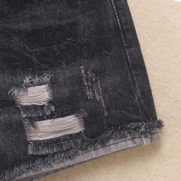 Lezser női farmer rövidnadrág szakadt motívumokkal