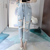 Mūsdienīgi sieviešu džinsi ar augstu vidukli un plēstiem motīviem