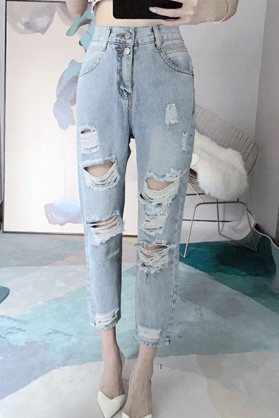 Mūsdienīgi sieviešu džinsi ar augstu vidukli un plēstiem motīviem