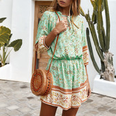 Salopetă scurtă de damă casual cu mâneci 7/8 și motive florale