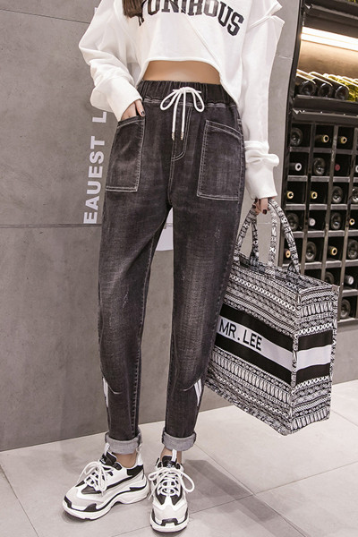 Alkalmi női farmer fűzős és zsebes