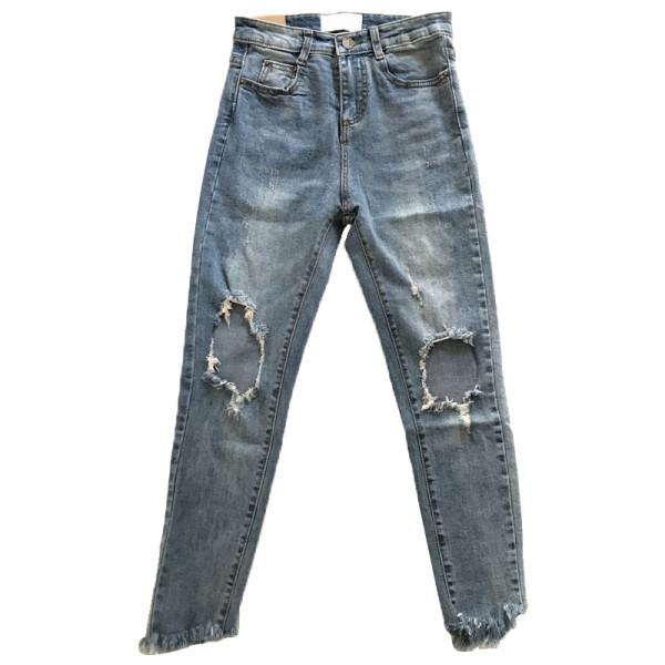 Modern női farmer Karcsú modell szakadt motívumokkal és zsebekkel