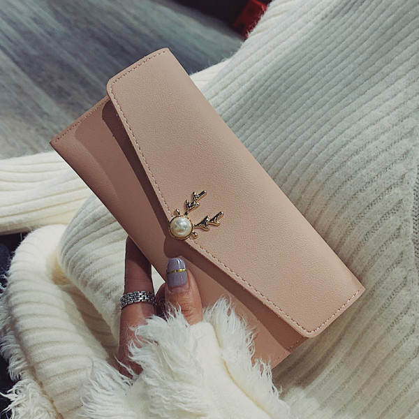 Moteriška piniginė iš eko odos su metaliniu užsegimu