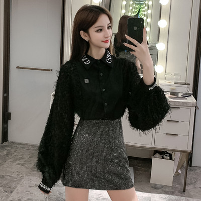 Stílusos női ing klasszikus gallérral és bojttal