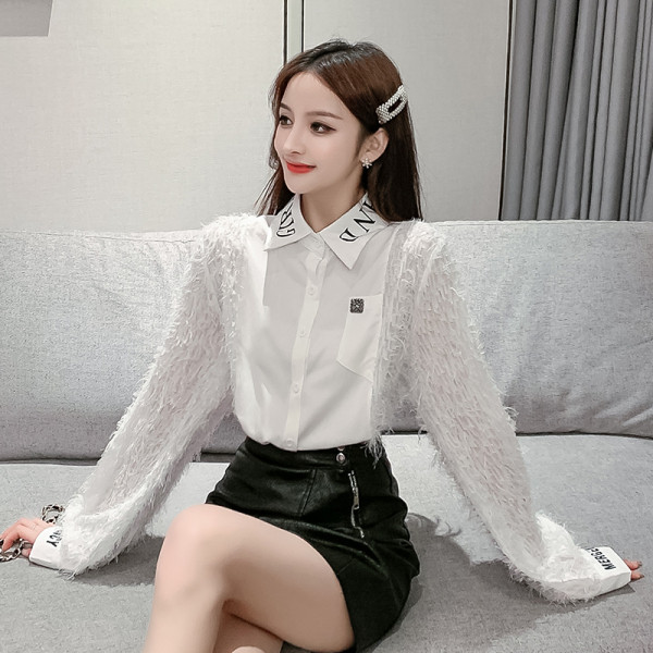 Stílusos női ing klasszikus gallérral és bojttal