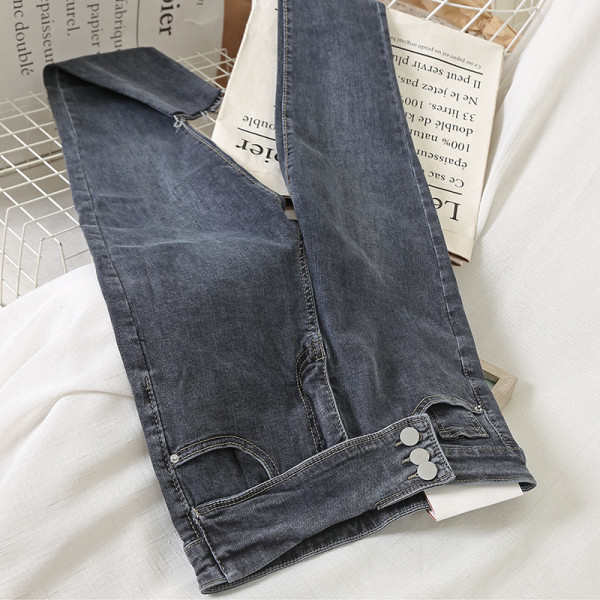 Sieviešu ikdienas garie džinsi ar augstu vidukli un pogām