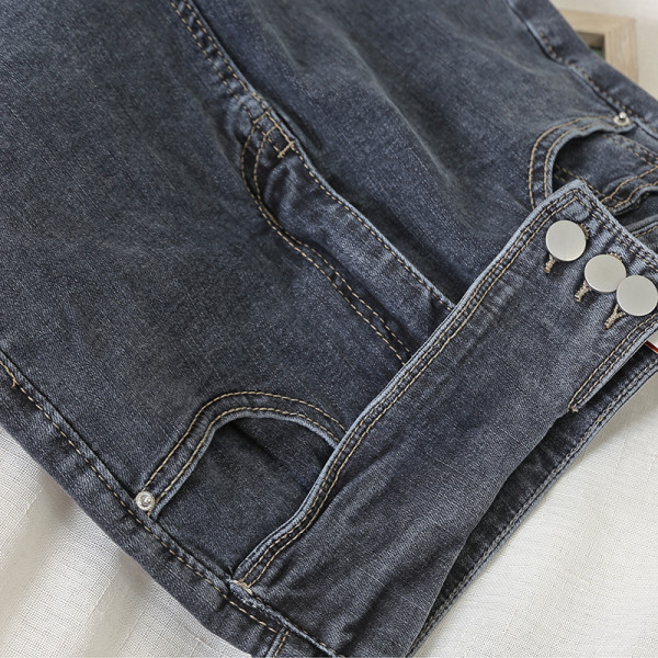 Sieviešu ikdienas garie džinsi ar augstu vidukli un pogām