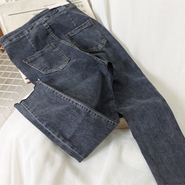 Sieviešu ikdienas garie džinsi ar augstu vidukli un pogām