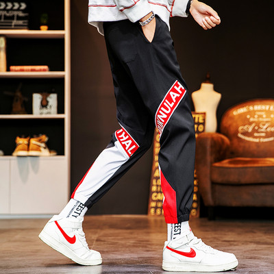 Ikdienas vīriešu bikses ar uzrakstiem un kabatām