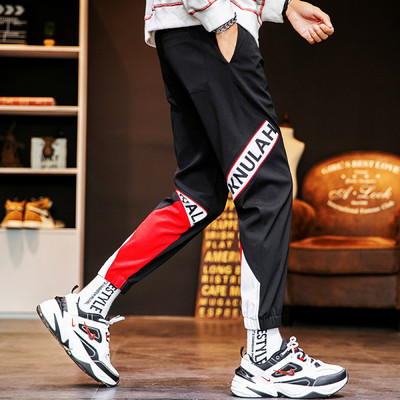 Ikdienas vīriešu bikses ar uzrakstiem un kabatām