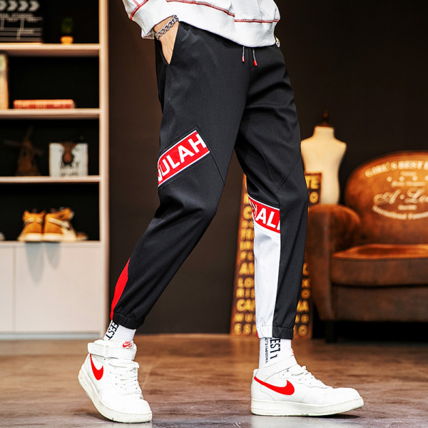 Ikdienas vīriešu bikses ar uzrakstiem un kabatām