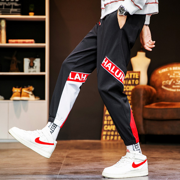 Ikdienas vīriešu bikses ar uzrakstiem un kabatām