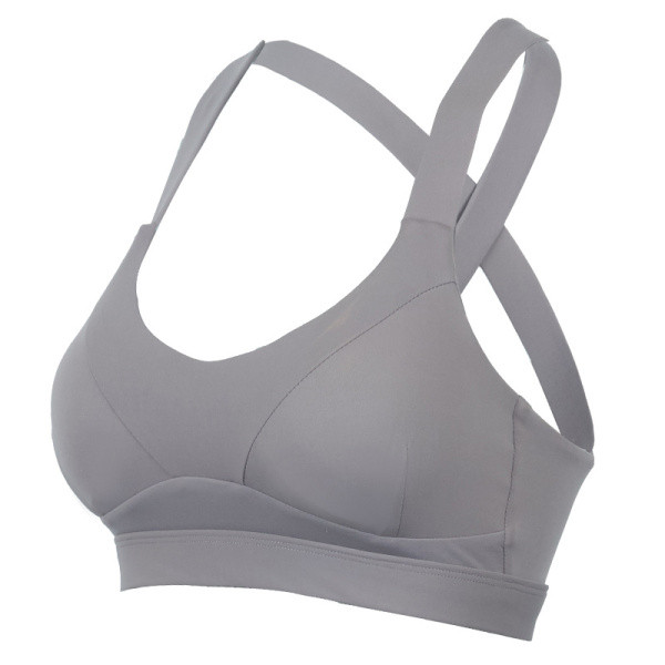 Moteriška sportinė krūtinė su kryžminiais dirželiais iš greitai džiūstančio audinio