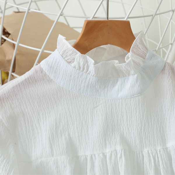 Női alkalmi ing magas gallérral és hosszú ujjú fehér színben