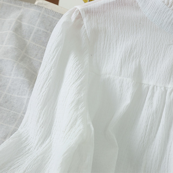 Női alkalmi ing magas gallérral és hosszú ujjú fehér színben