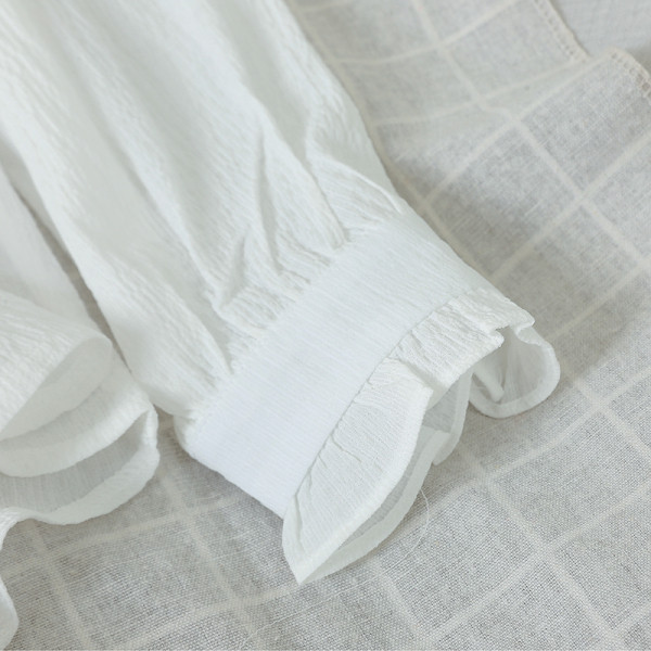 Női alkalmi ing magas gallérral és hosszú ujjú fehér színben