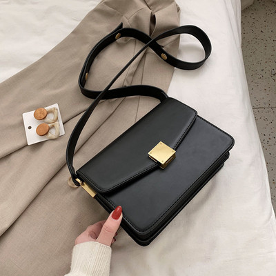 Kasdieninis moteriškas krepšys su metaliniu užsegimu ir ilga rankena