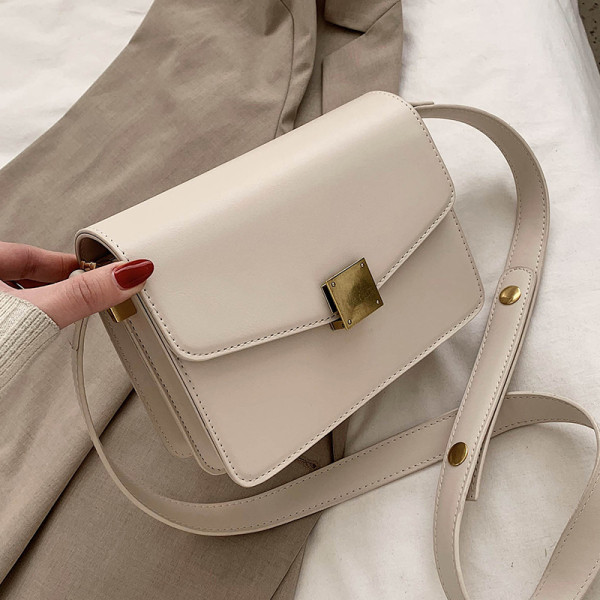 Kasdieninis moteriškas krepšys su metaliniu užsegimu ir ilga rankena