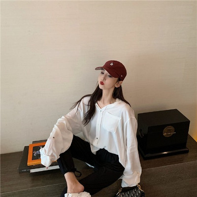 Ilgi moteriški asimetriški marškiniai klasikine apykakle