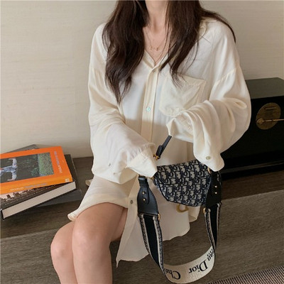 Ilgi moteriški asimetriški marškiniai klasikine apykakle