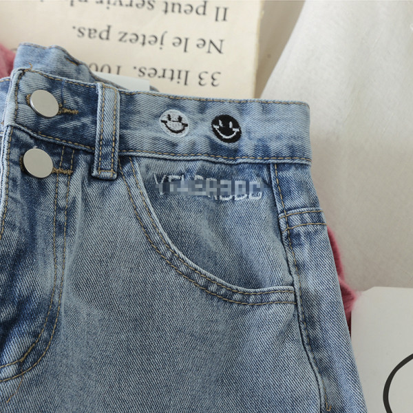 Sieviešu džinsi ar augstu vidukli un kabatām zili platā modelī